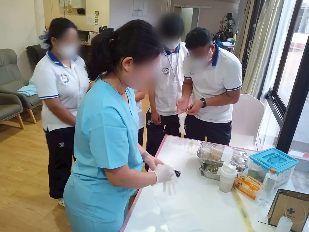 VAI student volunteers, glove and infection-control technique session, Bangkok